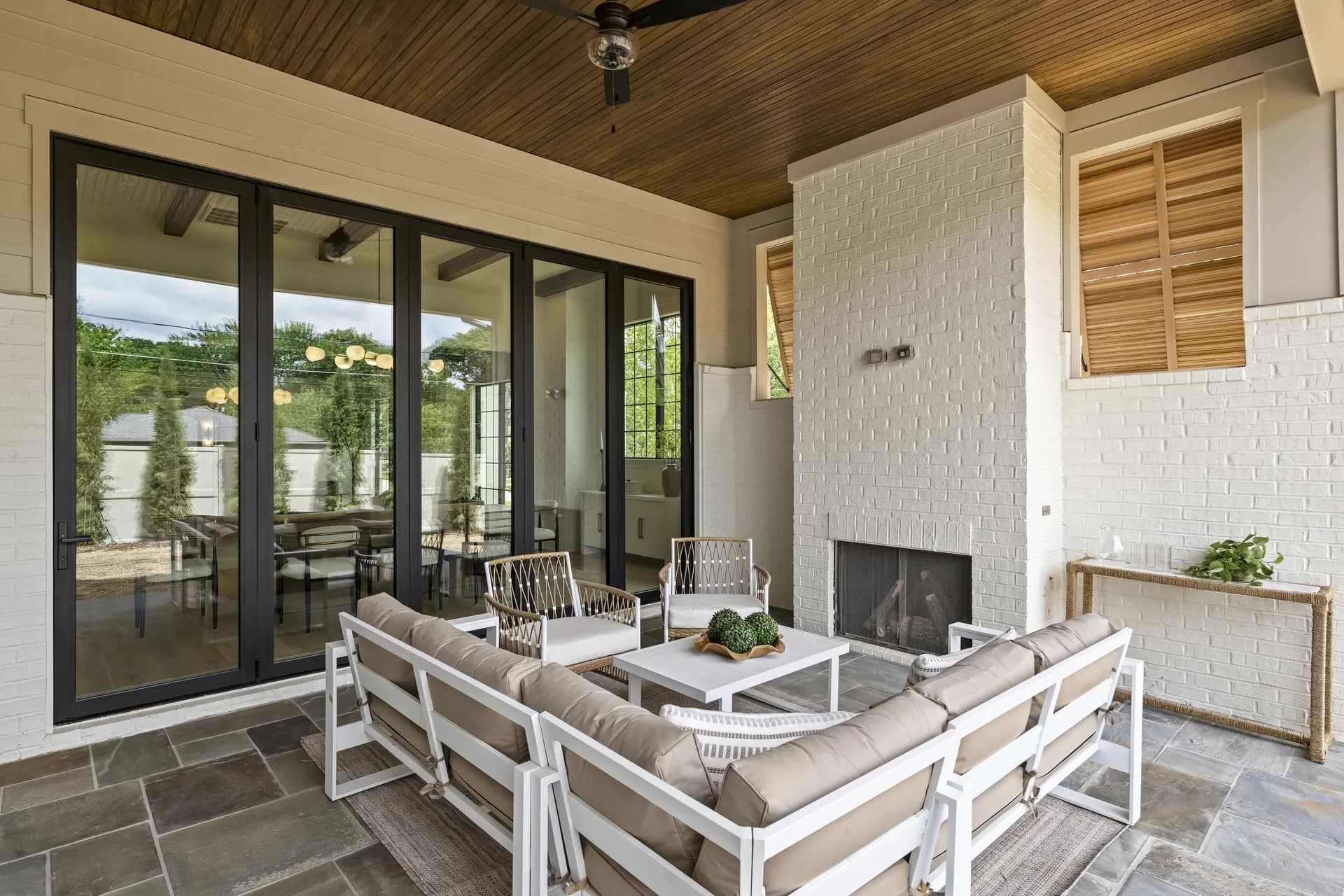 Covered patio and outdoor living area at the completed 1205 Jersey Ln home.