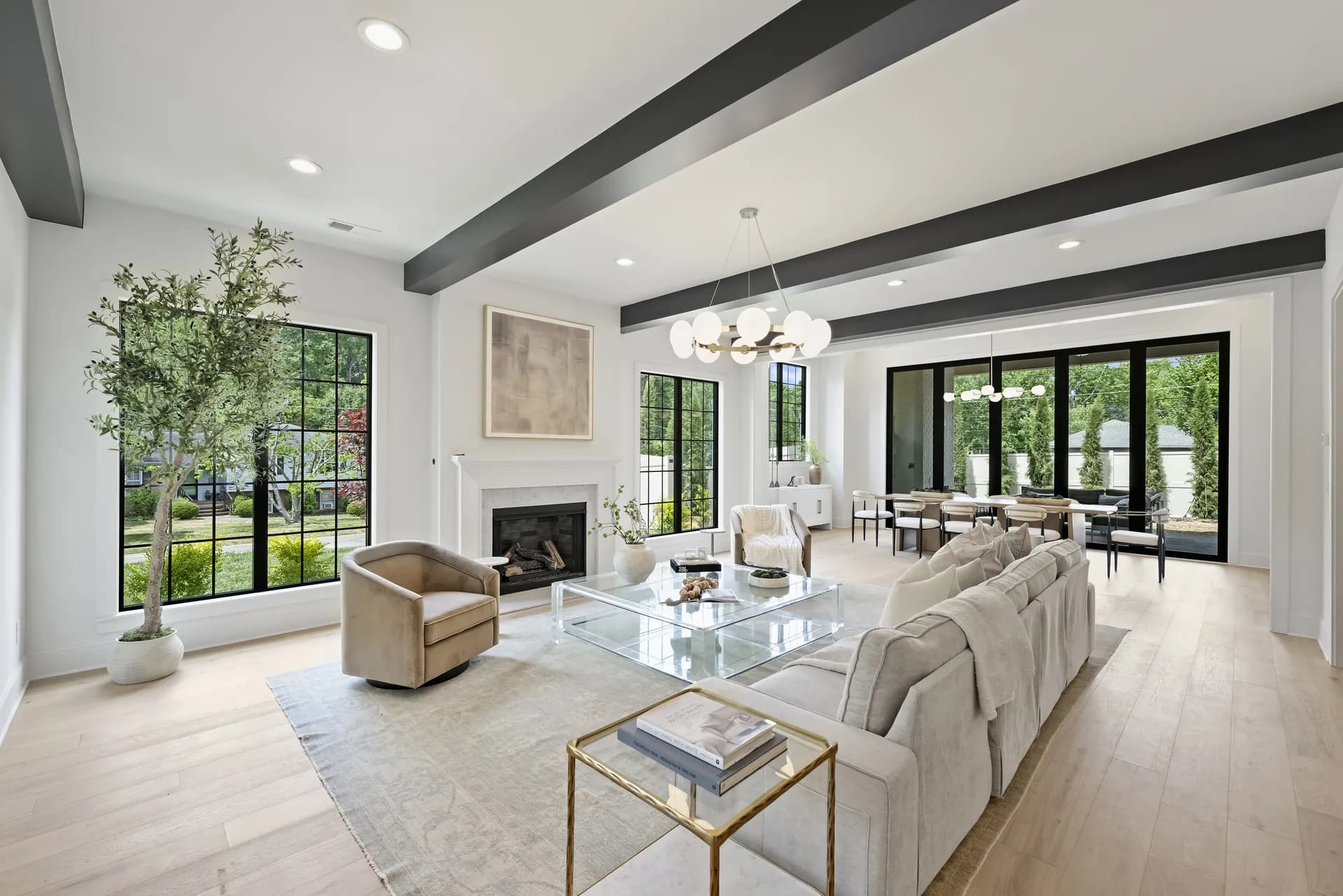 Living room with garden-facing windows at the completed 1205 Jersey Ln home.