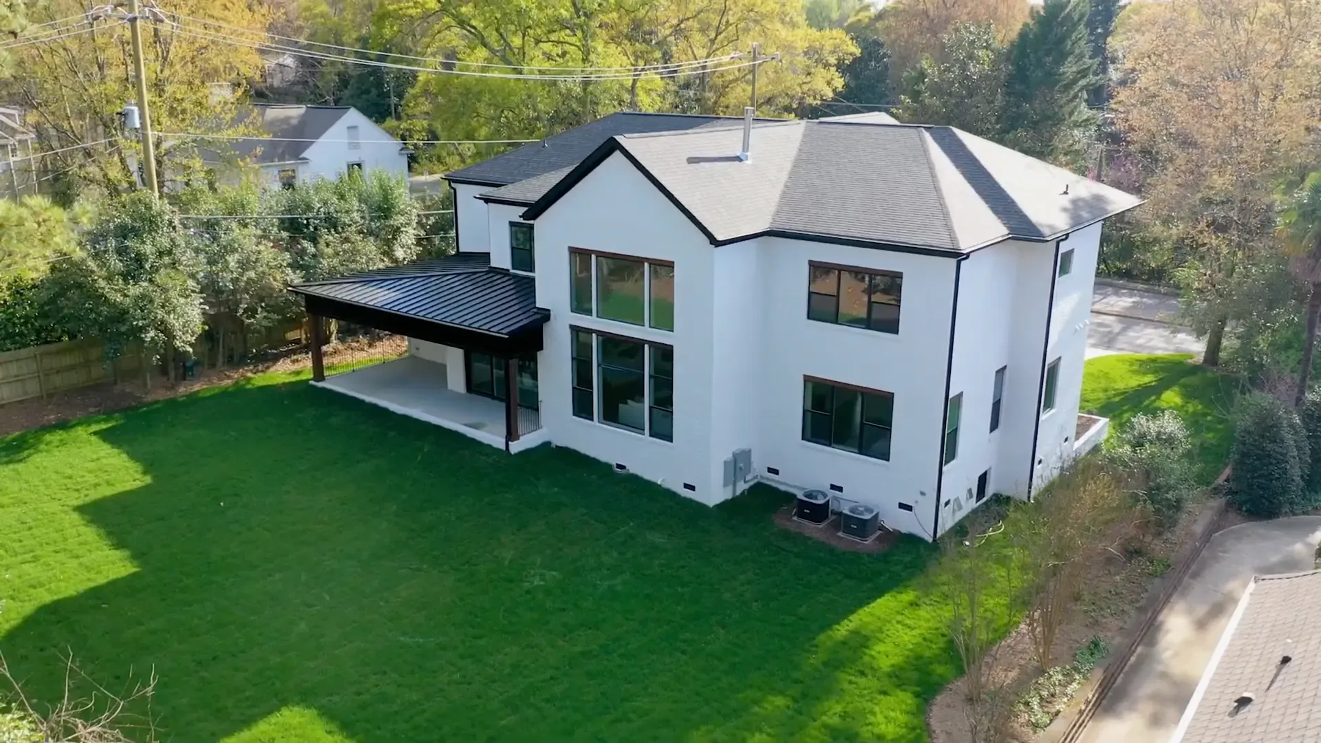 Rear exterior and lawn at the completed 2011 Providence Rd home