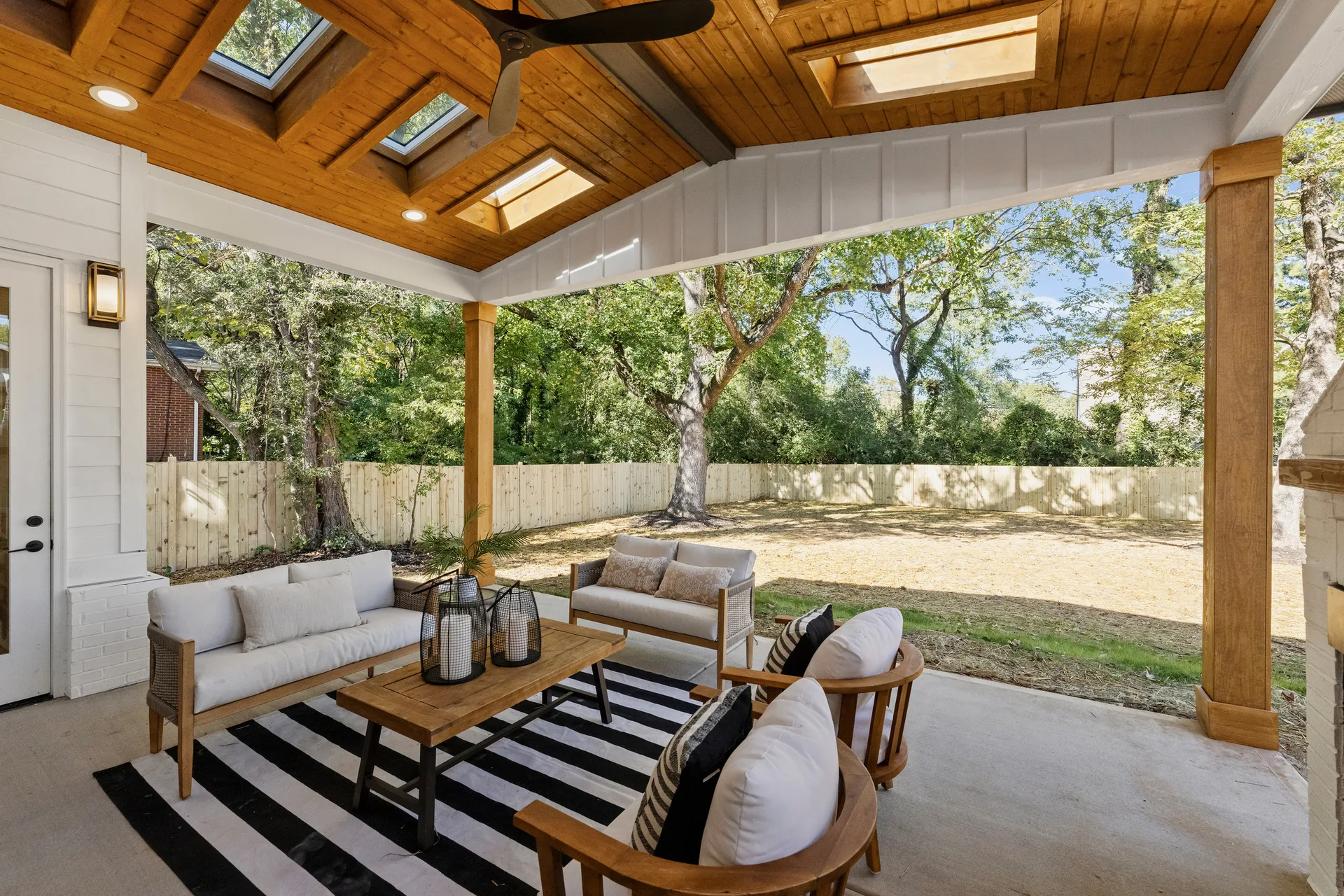 Covered patio and garden at the completed 563 Lyttleton Dr home